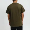 Converse x Kim Jones Crossover da uomo, maglietta a maniche corte con collo rotondo in tinta unita, etichetta piccola, verde oliva