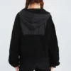 Giacca con cappuccio in lana d’agnello con zip integrale, nera