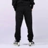 Pantaloni jogger con motivo a stella e chevron ricamati FT Taglie asiatiche “Nero”